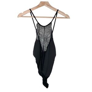 ASOS black bodysuit with lace V detail and open cris cross strap back